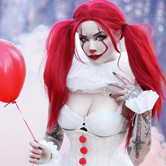 Cosplayer. looks fabulously freaky cosplaying as Pennywise from It. 